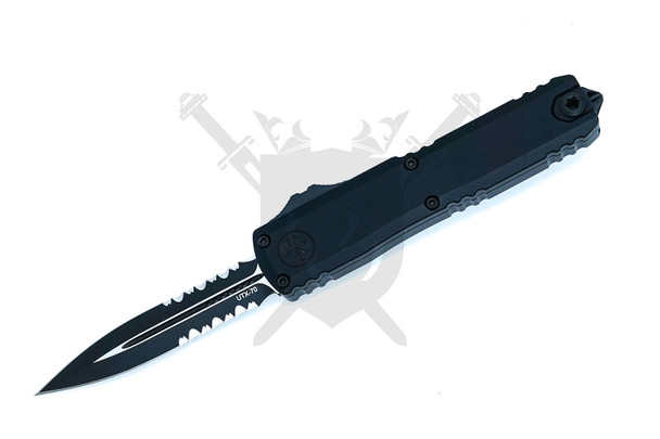 Microtech UTX-70 Gen IV Tactical automatic OTF knife with black aluminum handle and black partially serrated double edge dagger blade open front view