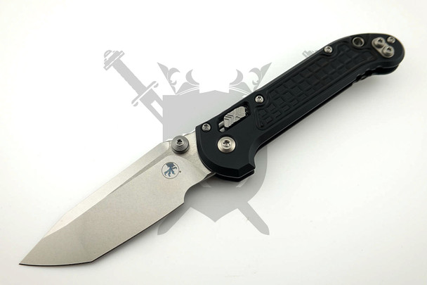 Microtech LUDT RAM-LOK manual folding knife with stonewashed M390MK tanto blade and black Frag-machined aluminum handle open.