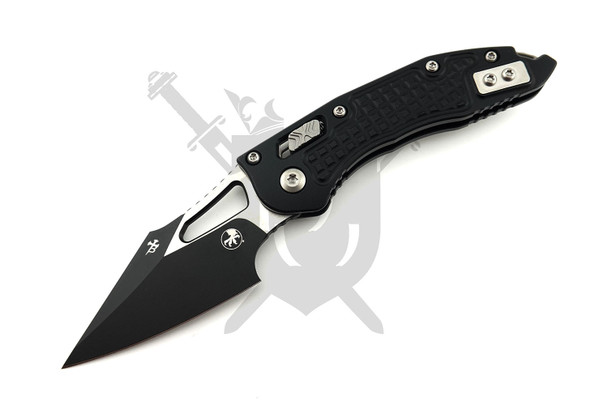 Microtech M-Stitch RAM-LOK manual folding knife 169MRL-1FR with black M390MK spear point blade and Black Frag aluminum handle front view.
