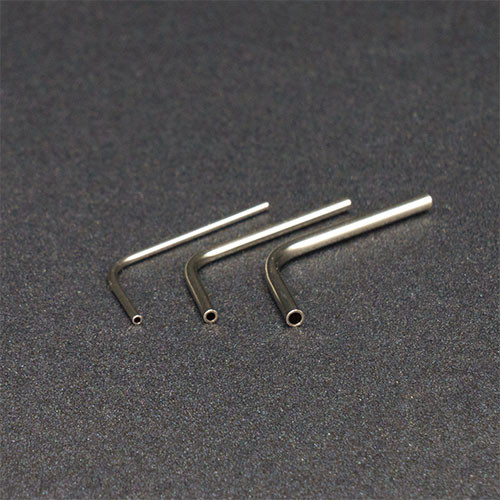 Bent stainless steel tubing for microfluidic application in tight spaces