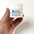 Hand holding Super Hydrating Cream, Janssen Cosmetics