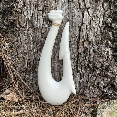 Ceramic hook wall hanging from Stepahead ceramics. White.