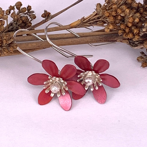 Clematis flower earrings hand crafted from copper and sterling silver.
