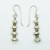 Brass and silver periperi earrings, Justin Ferguson.