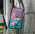 Leather cell phone bag featuring artwork be NZ artist Angie Dennis.