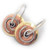 copper, brass and silver spiral drops by NZ jewellery designer Nick Feint, Stone Arrow
