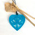 Kowhaiwhai heart design resin pendant from SoNZ - aqua