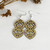 Double kowhaiwhai heart earrings in metallic finish gold resin