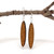 Oval wood earrings with a kowhaiwhai design.