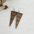 Copper metallic finish resin kowhaiwhai triangle earrings