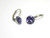 Tanzanite coloured swarovski crystal earring in a loop setting, silver plate over tombac, from Isa Dambeck.