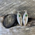 Silver elliptical koru and pounamu dot earrings
