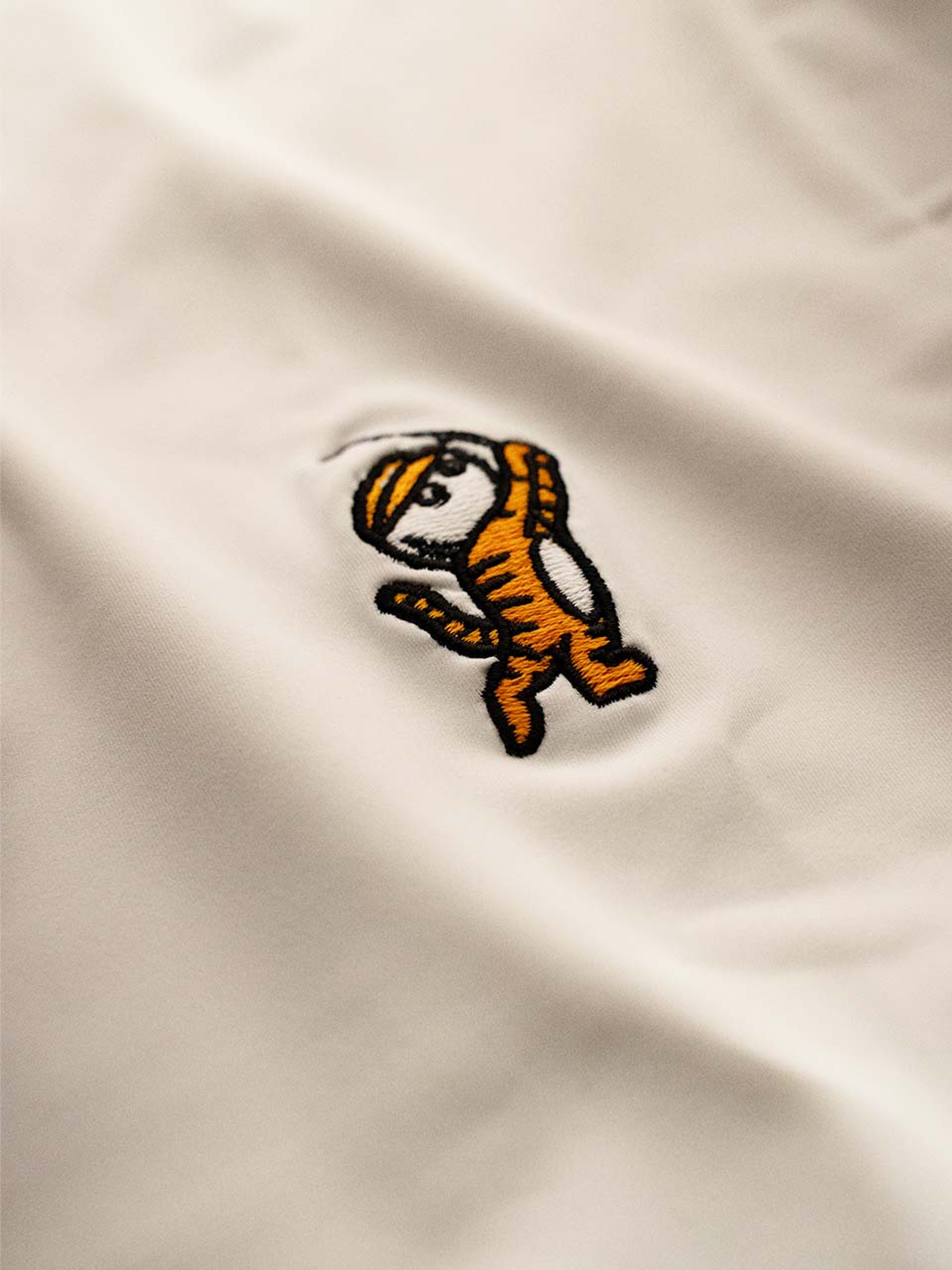 Malbon Evergreen Tiger Buckets Performance Pique Polo - White