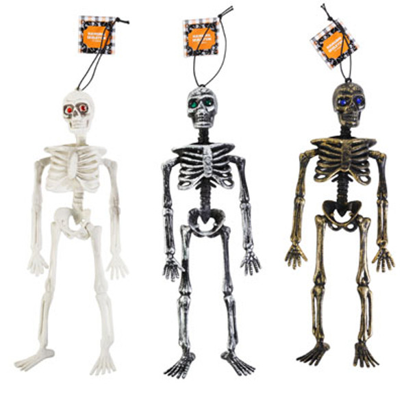 SKELETON 12.5IN 3ASST FINISH W/GEM EYES HLWN HANGTAG BLACK BUNGEE HANGER