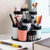 A lifestyle image of decoupage pencil and brush caddy made with Mod Podge.