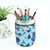 A lifestyle image of a vase made with Sculpey Premo Accents Polymer Clay.