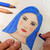 A lifestyle image of a Grafix Dura-Bright Pad in use with colored pencils.