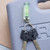 A fourth image of Kikkerland Mini Level Keychain