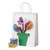 A lifestyle image of Pacon Spectra Deluxe Bleeding Art Tissue in use for gift wrapping.