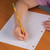 A lifestyle image of a Dixon Ticonderoga #2 Pencil in use.