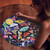 A lifestyle image of an EeBoo Piece & Love Moths 500-Piece Puzzle in use.