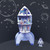 A lifestyle image of a Djeco Color, Assemble, & Play Space Rocket Kit in use.