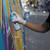 A lifestyle image of MTN 94 Spray Paint in use on a mural.
