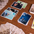 A lifestyle image of an Asmodee Sea Salt & Paper Game in use.