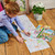 A lifestyle image of an EeBoo Wild Things Fold-Out Coloring Book.