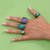 A lifestyle image of GeoCentral Vintage Mood Rings in use.