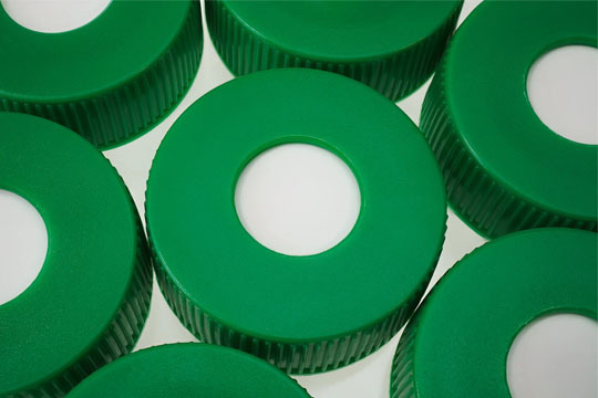SeptaSecure blue silicone septa caps in a group of six.