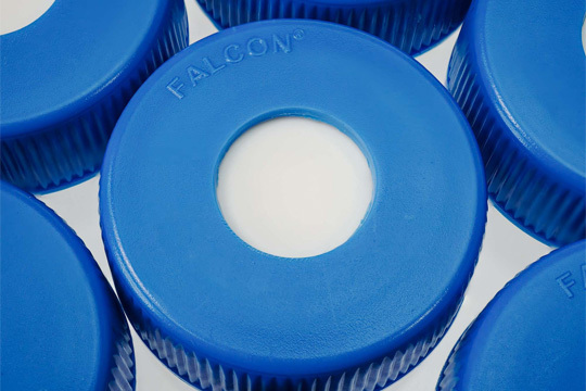 SeptaSecure blue silicone septa caps in a group of six.