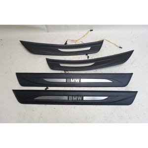 Damaged 2011-2016 BMW F10 5-Series Illuminated Door Sill Cover Set Front Rear OE