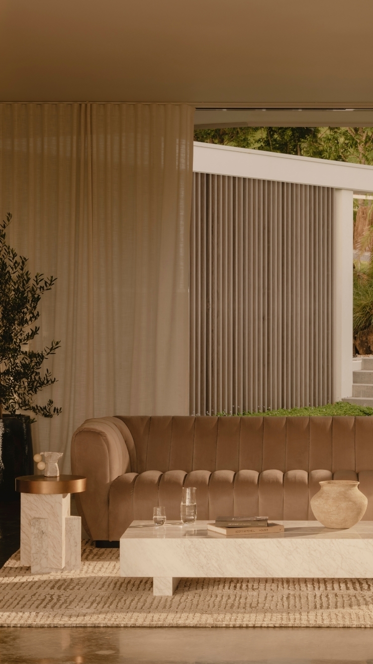 An image of an art deco style sofa in a living room