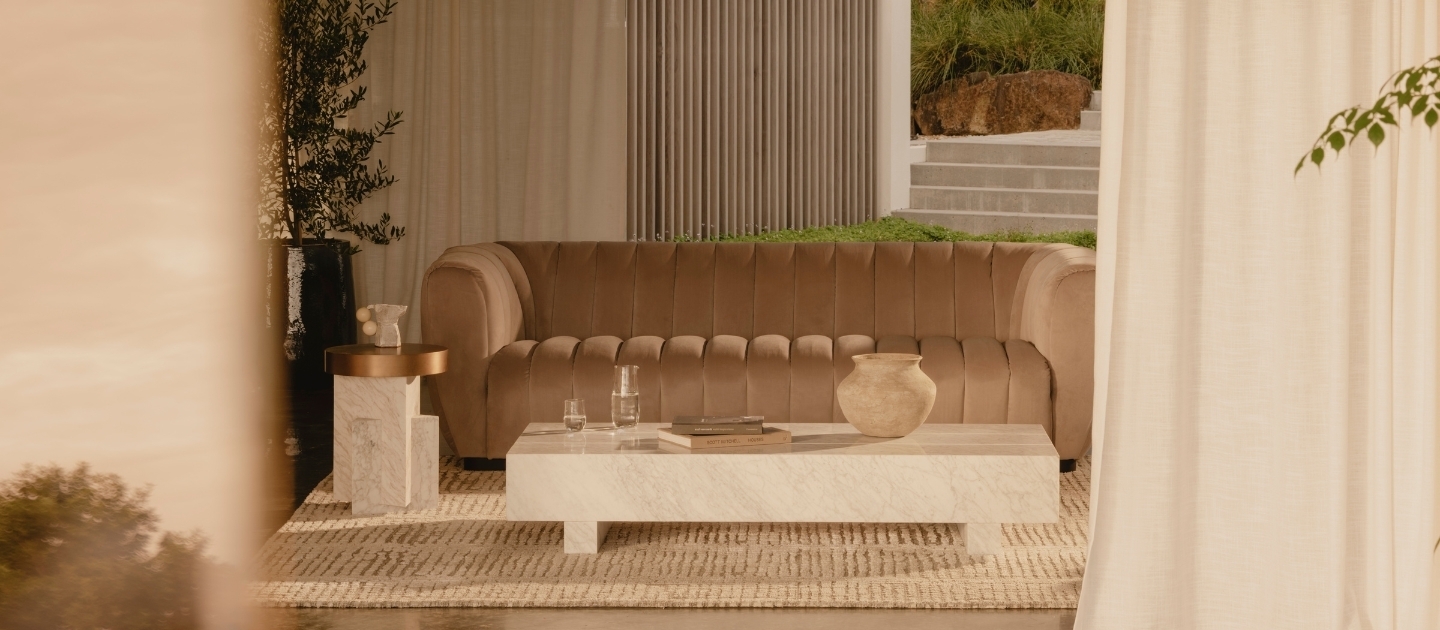 An image of an art deco style sofa in a living room