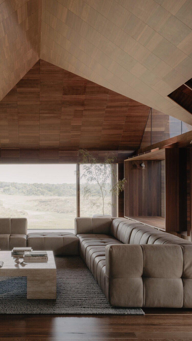 A large square-form sofa in a living room