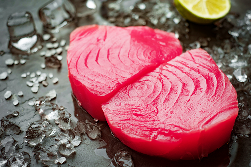 Each ahi tuna steak comes in convenient, individually vacuum-sealed packages. Ahi tuna steaks are treated with carbon monoxide for color retention, which is why they have a vibrant red color.