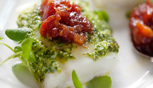 Wild Alaskan True Cod with dill pesto sauce and tomato chutney.