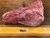 Raw Australian Wagyu Tri-Tip with rich marbling on cutting board