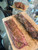 Australian F4 Purebred Wagyu skirt steak with rich BMS 8–9 marbling on a wooden cutting board