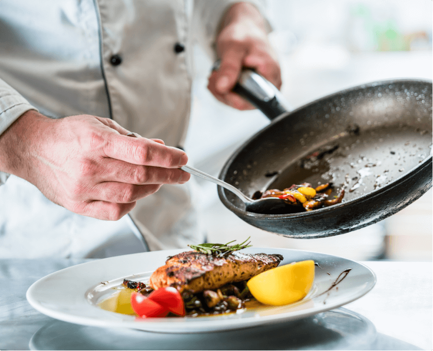 Person cooking seafood