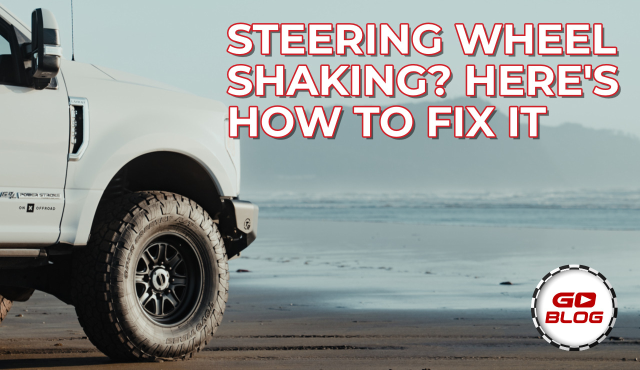 Aftermarket wheels and tires on a truck, illustrating steering wheel vibration after a wheel upgrade