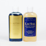 Two rounded clear bottles are pictured against a white background. One is Super CP Serum and has a gold label and the other is LacSal Serum and has a blue label with gold text. The LacSal Serum is a sepia? color.