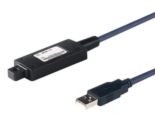 An ACA 11 configuration adapter with a USB cable connection.