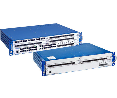 Two DRAGON MACH4x00 Backbone Switches with multiple Ethernet ports and modular connectivity slots.