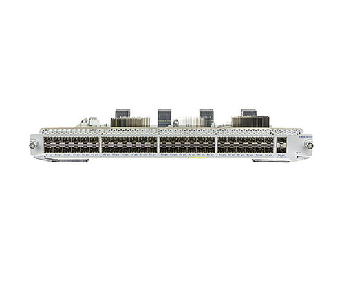 Front-facing view of a modular networking switch with multiple SFP ports and heat sinks.