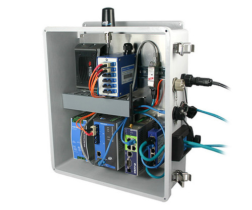 A rugged electronics enclosure with various mounted hardware, wiring, and external cable connections.