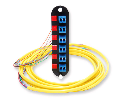 A fiber optic connector housing with six blue dual-port adapters and yellow pigtails.
