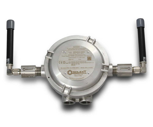An SWAA1133-421N0 Ethernet Radio device with two antennas and circular Solexy metal housing.