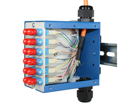 SNAP-12LC-MM Patch Panel with exposed fiber optic connections inside a blue metal DIN-rail enclosure.